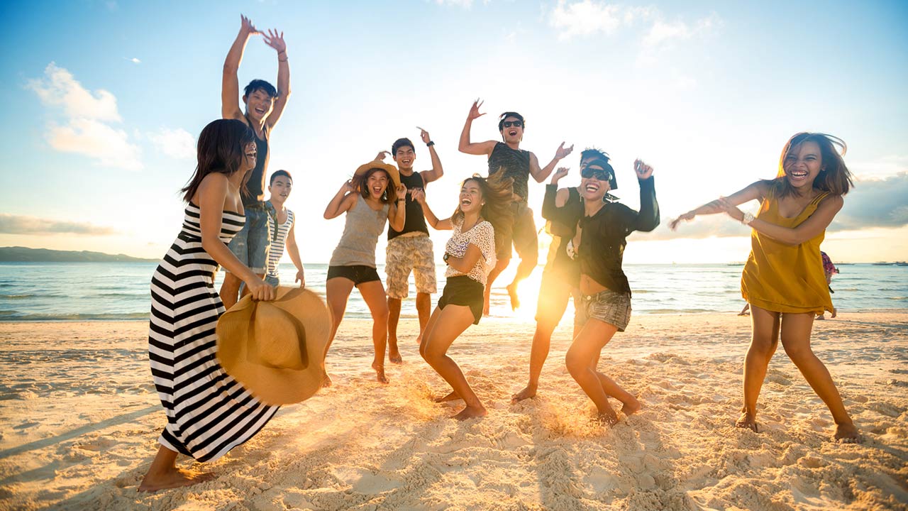 Happy young people on beach
